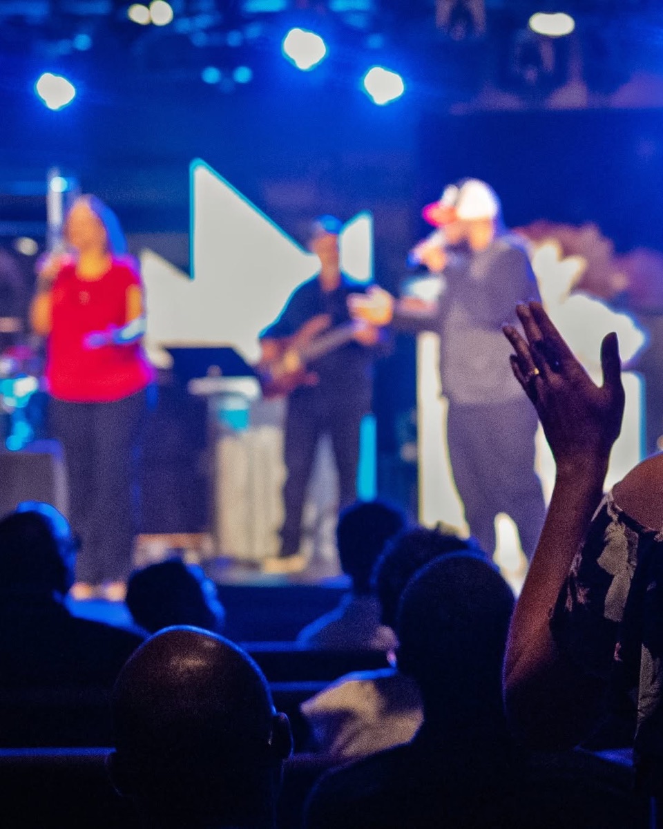 The Bridgeway Community Church congregation worshipping during a service