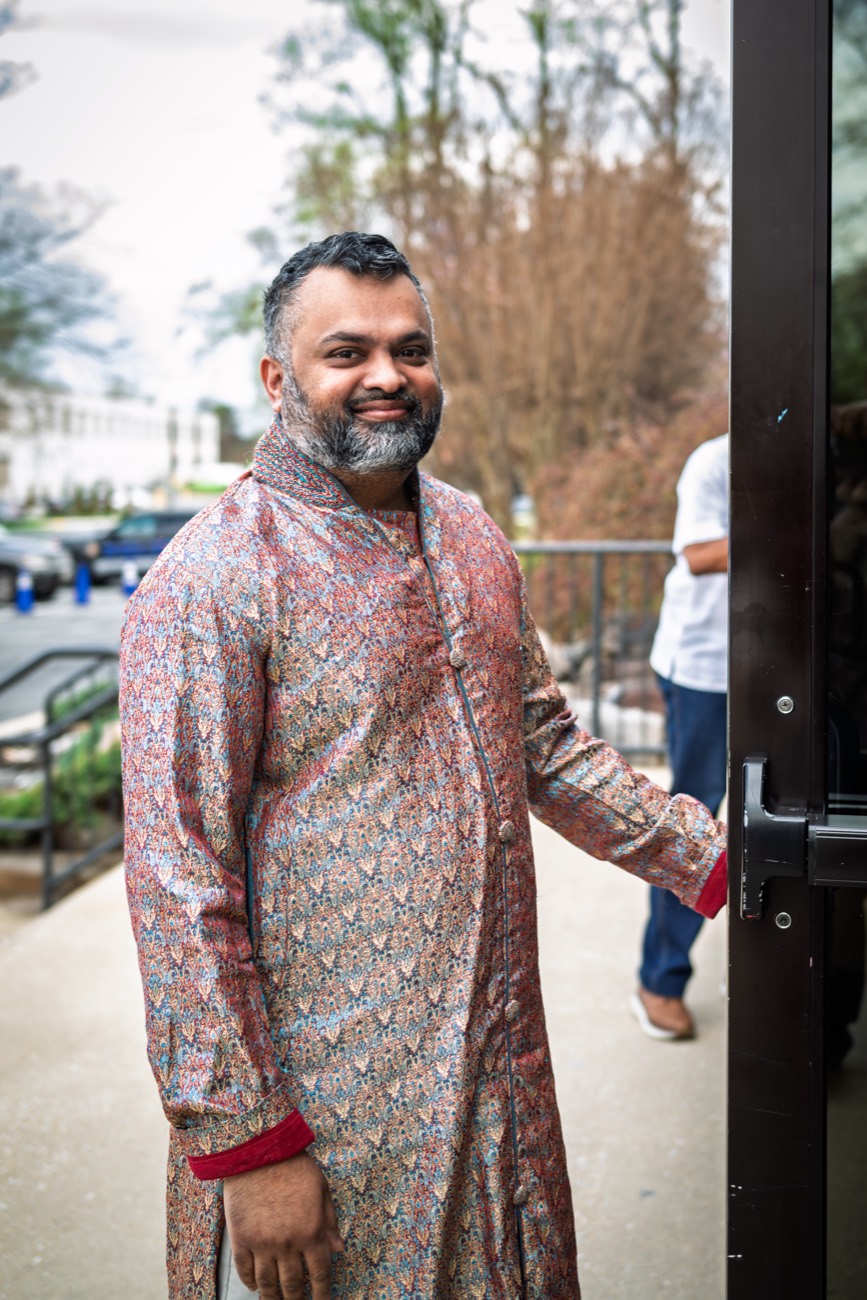 Tim Samuel at church on Easter Sunday, dressed in a sherwani