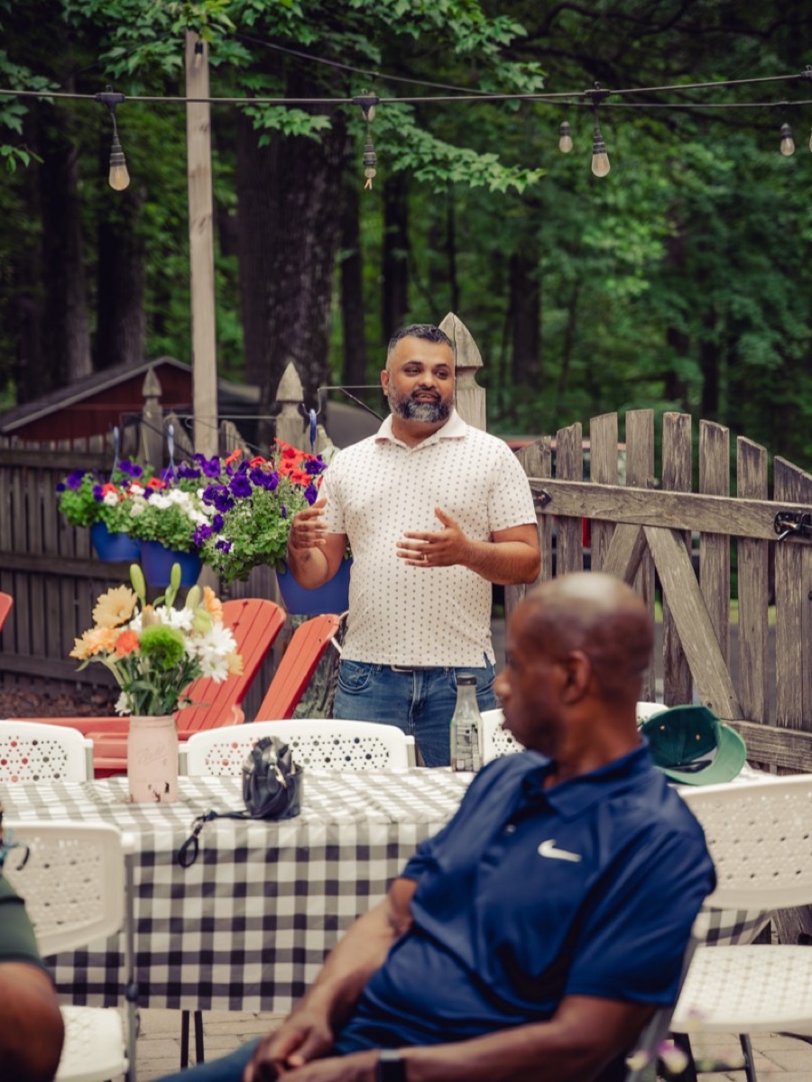 Tim Samuel, CPA, speaking with a group of church leaders